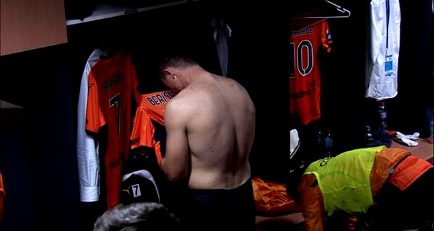 An emotional Besart Berisha in the locker room after his final game for the Roar
