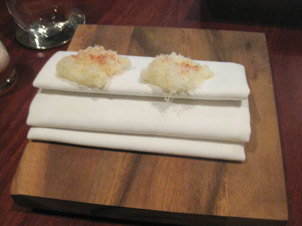 Deep fried manchego cheese in the style of a prawn cracker